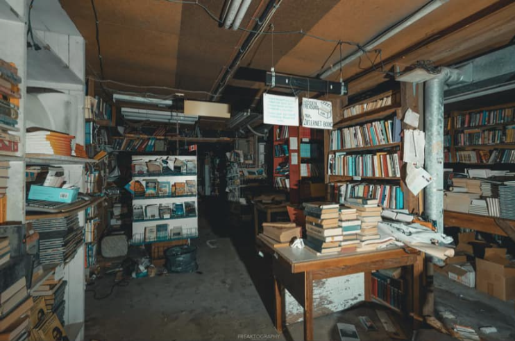 Dusty bookshelves full of books