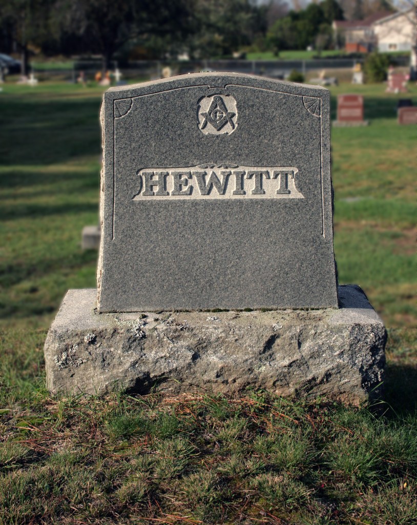 Square and compass symbol on a gravestone.