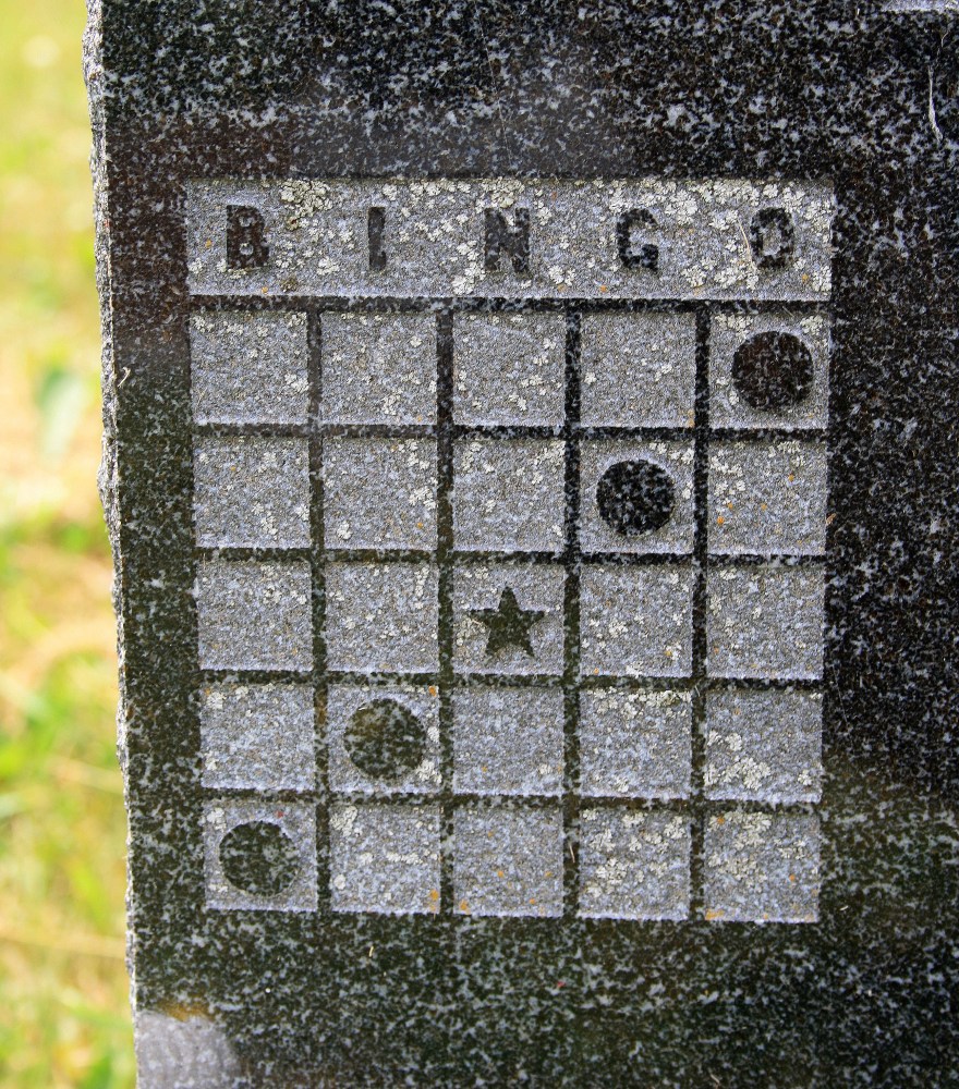 A Bingo card engraved on a headstone
