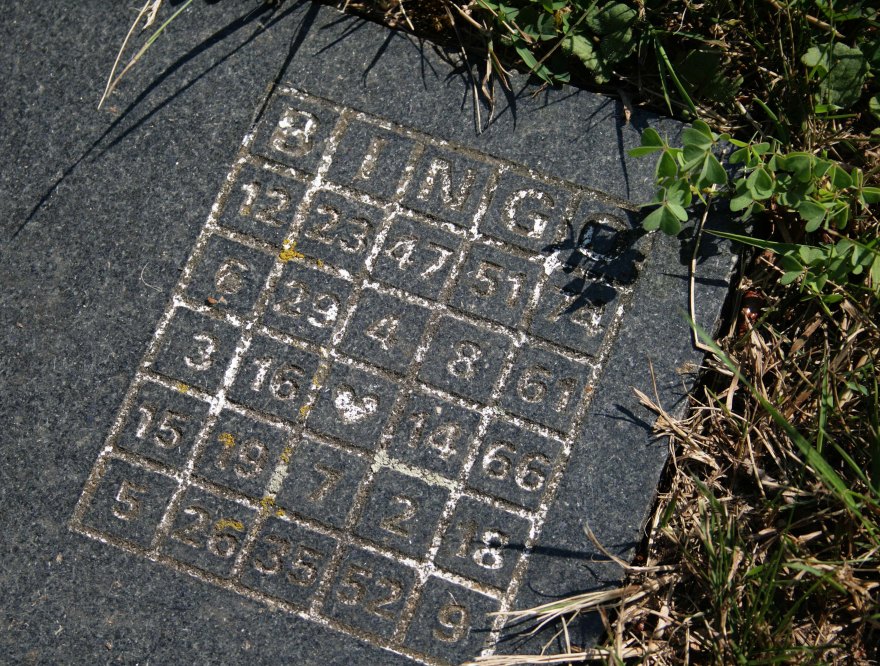 A Bingo card engraved on a tombstone