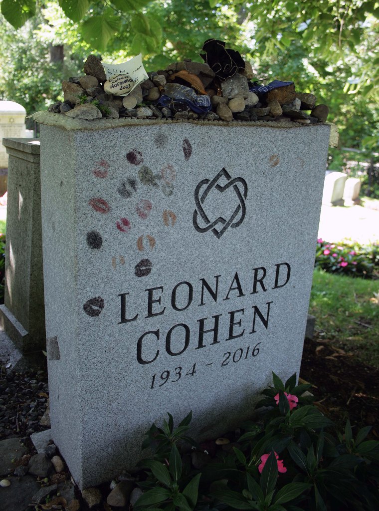 The unified heart emblem, on the grave of Leonard Cohen.