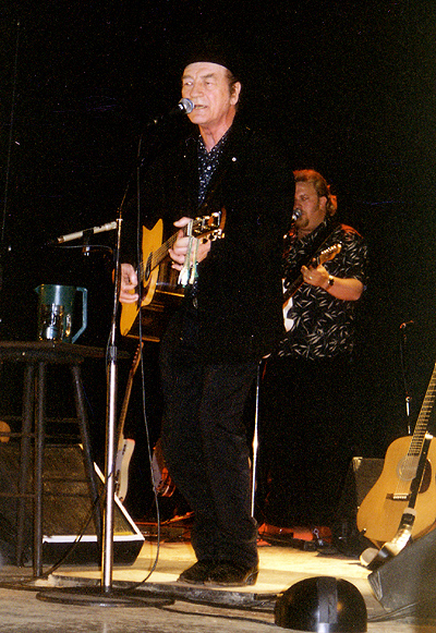 Stompin' Tom Connors performing on stage.